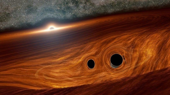 Астрономы озадачены вспышкой света от сталкивающихся черных дыр. фото 2